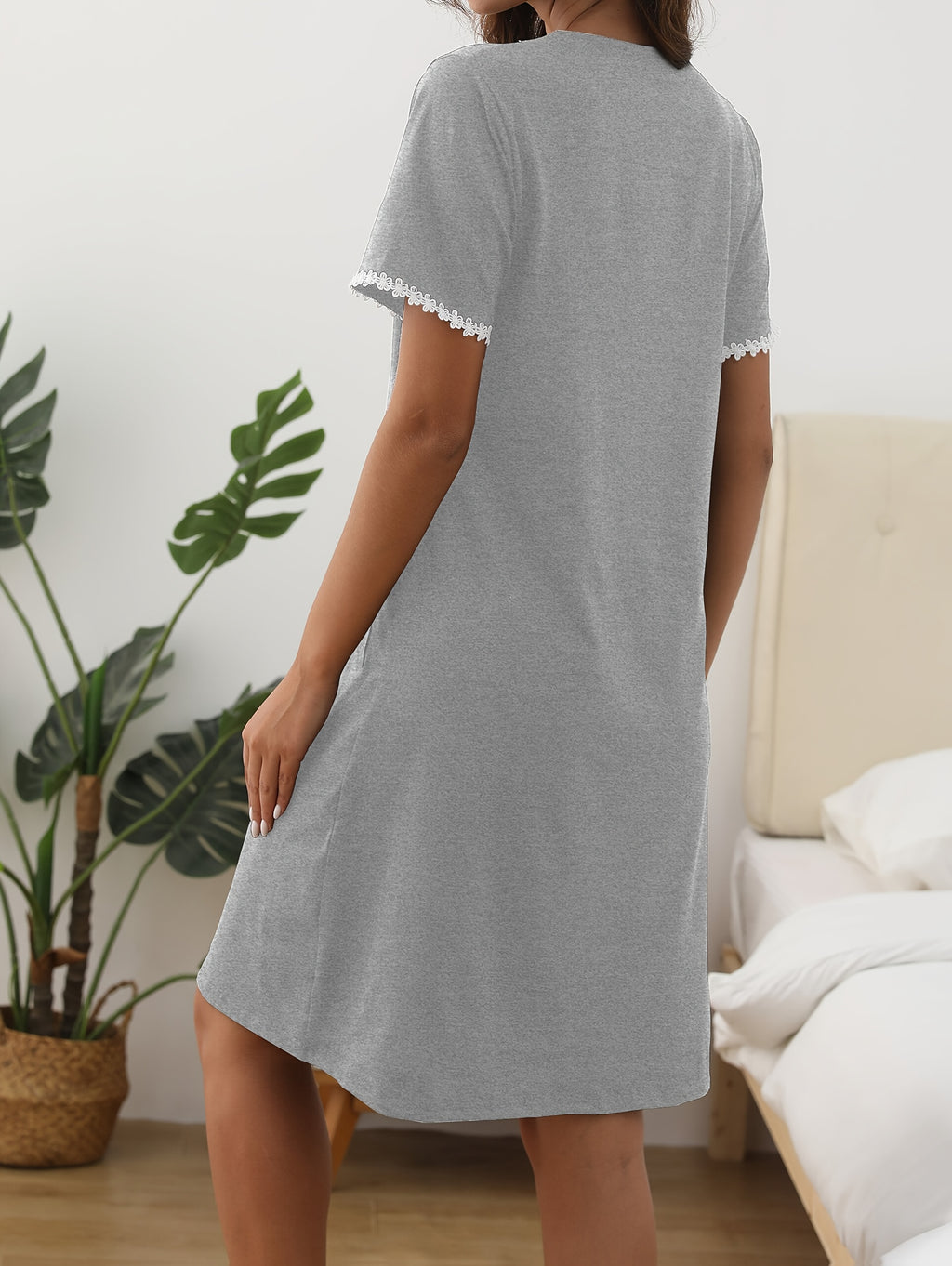 Women's black button-up dressing gown with pearl buttons