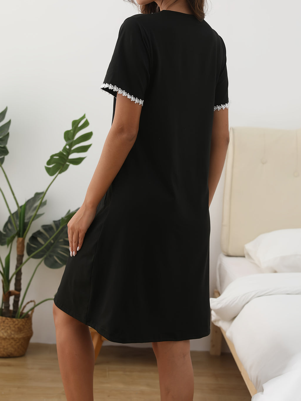 Women's black button-up dressing gown with pearl buttons