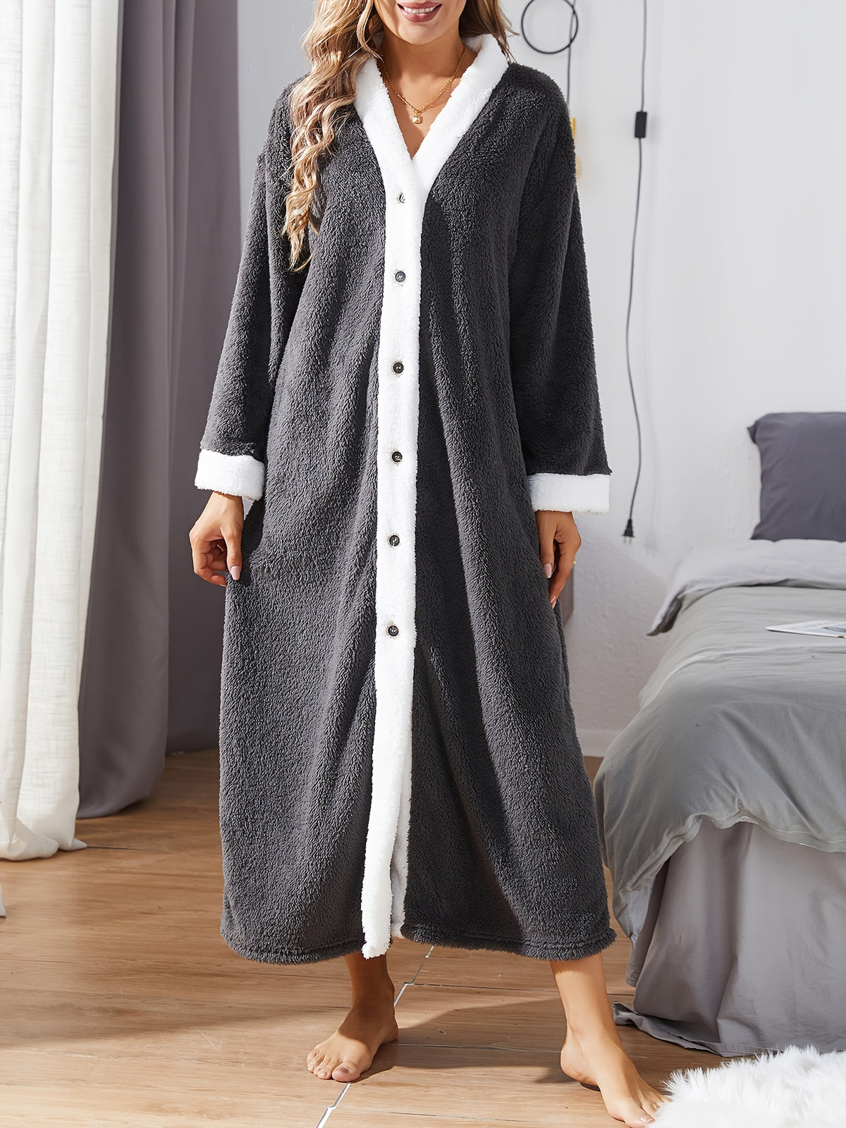 Women's black button-up fleece dressing gown