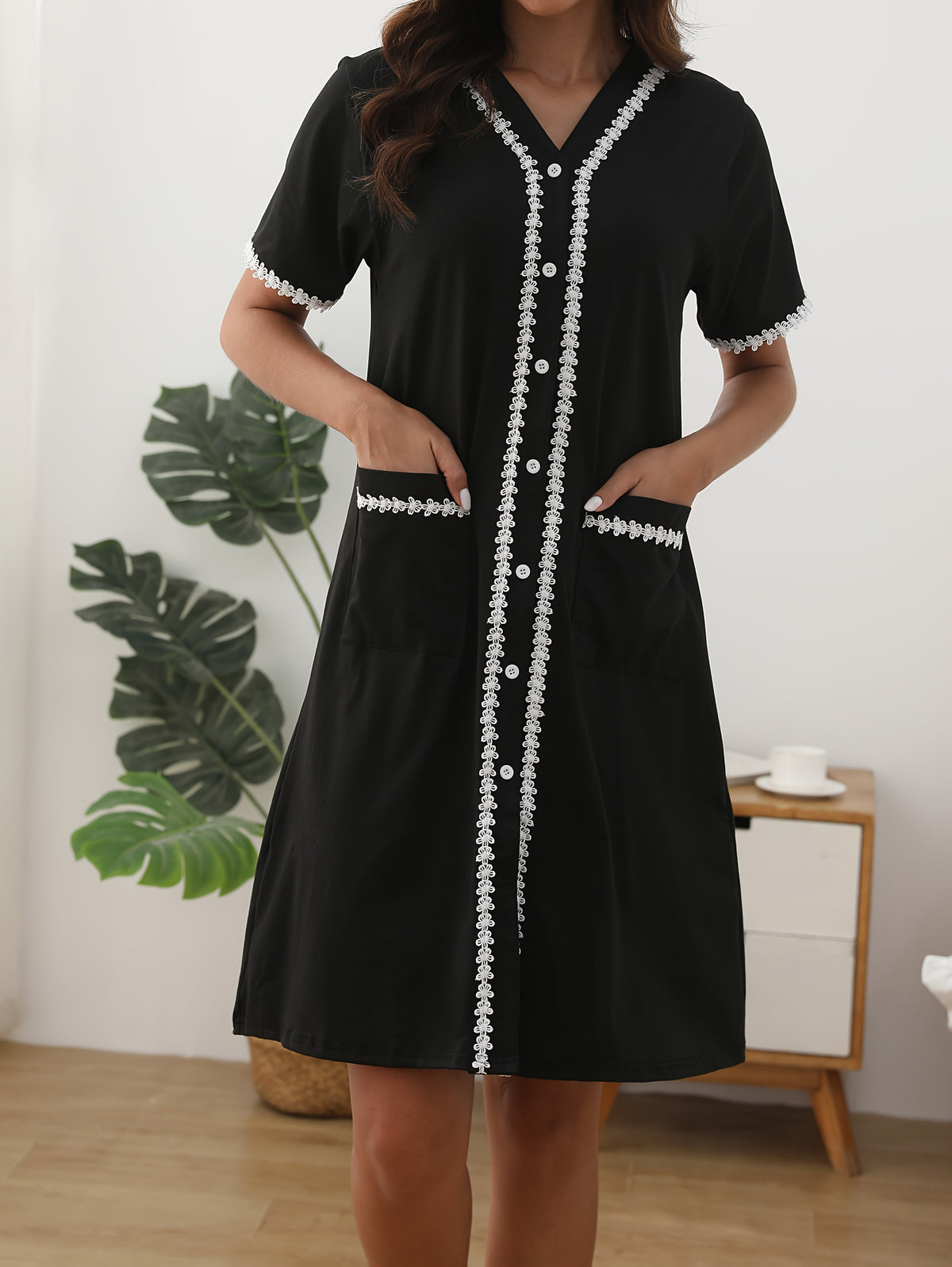 Women's black button-up dressing gown with pearl buttons