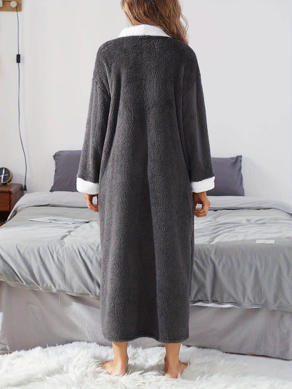 Women's black button-up fleece dressing gown