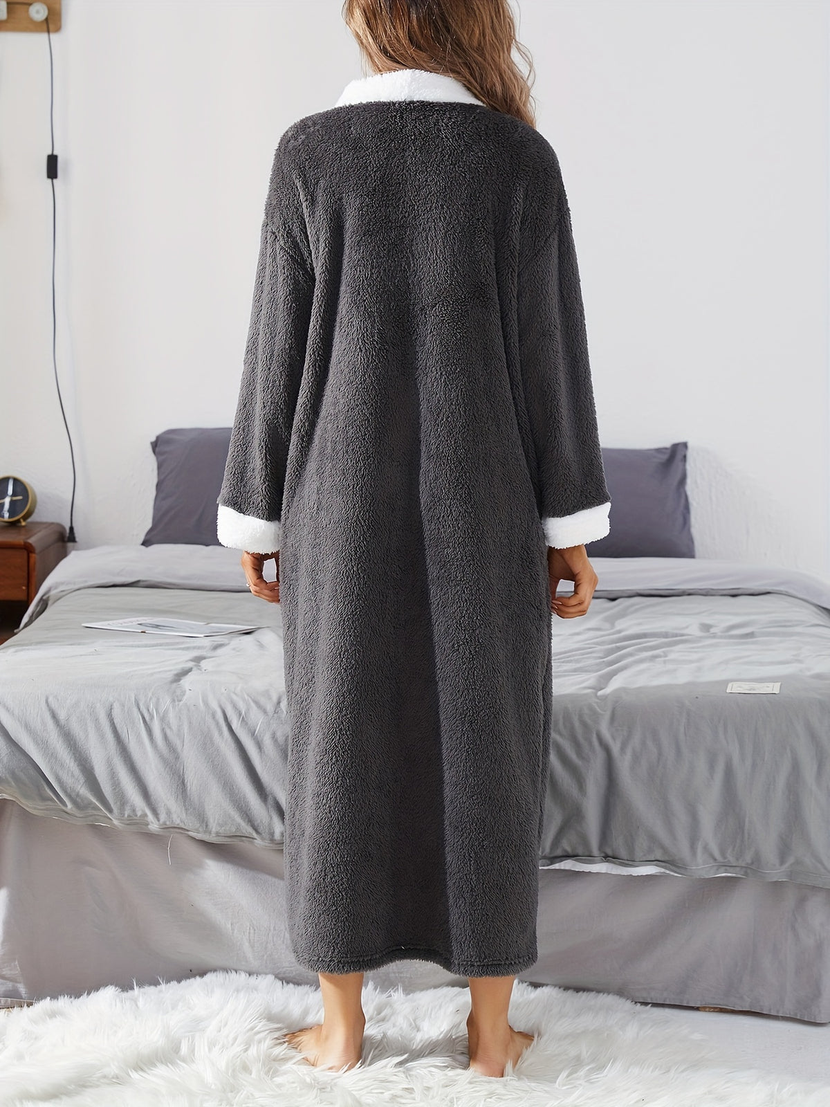 Women's black button-up fleece dressing gown